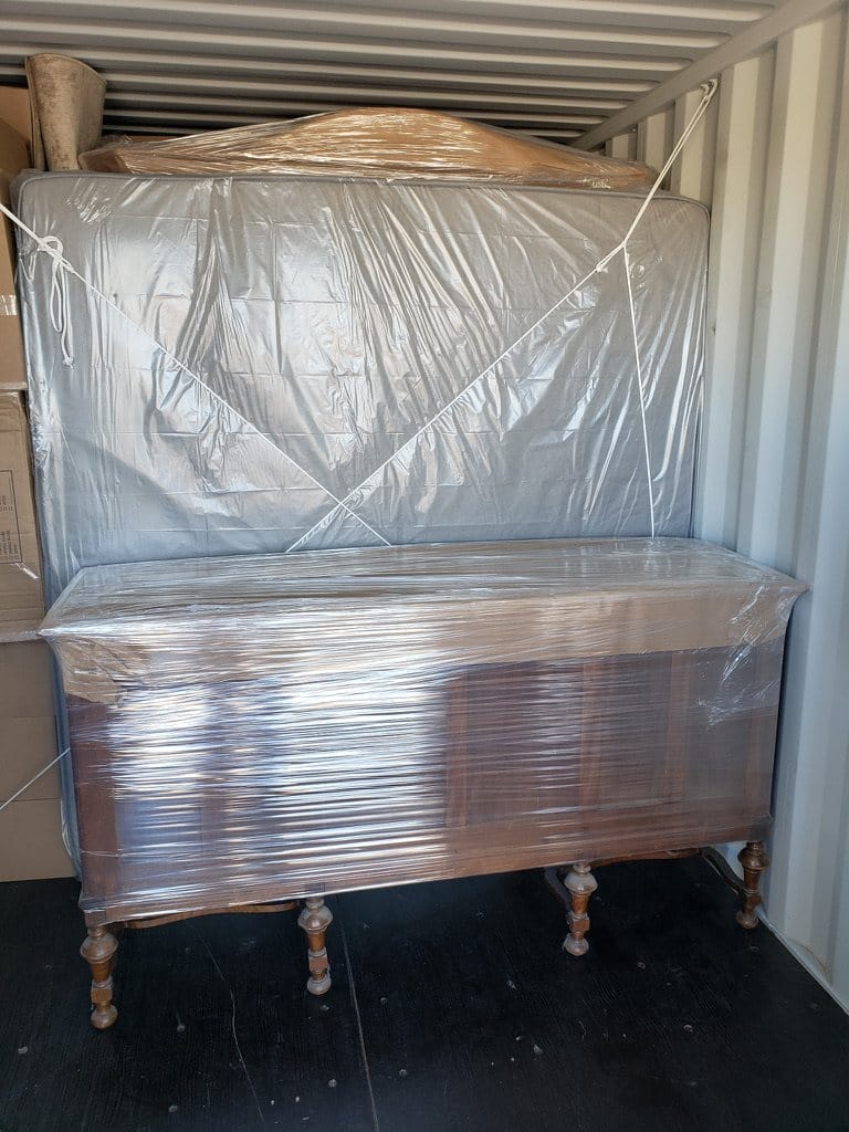 Furniture fully padded and shrink-wrapped for safe transport